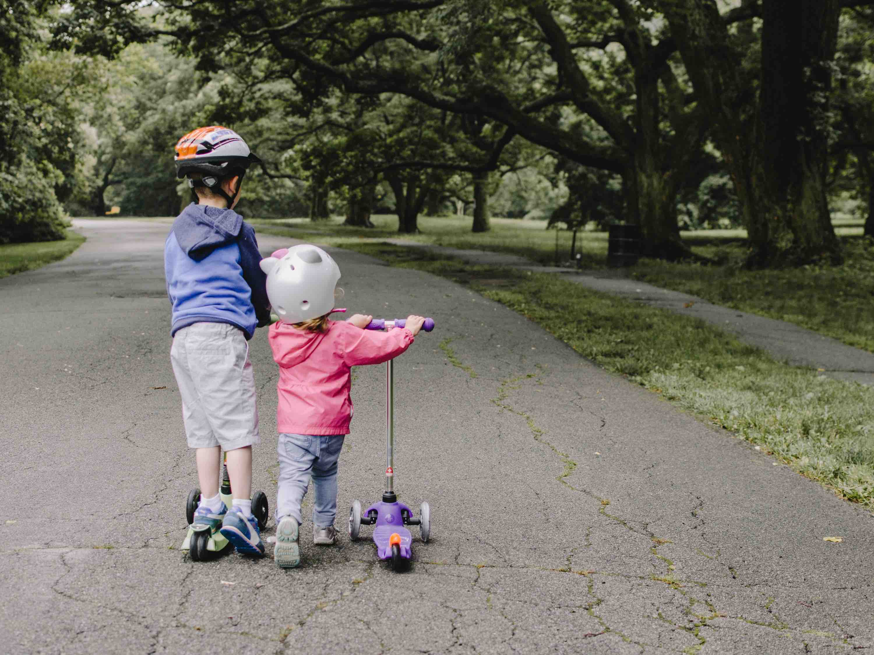Siblings on a scooter