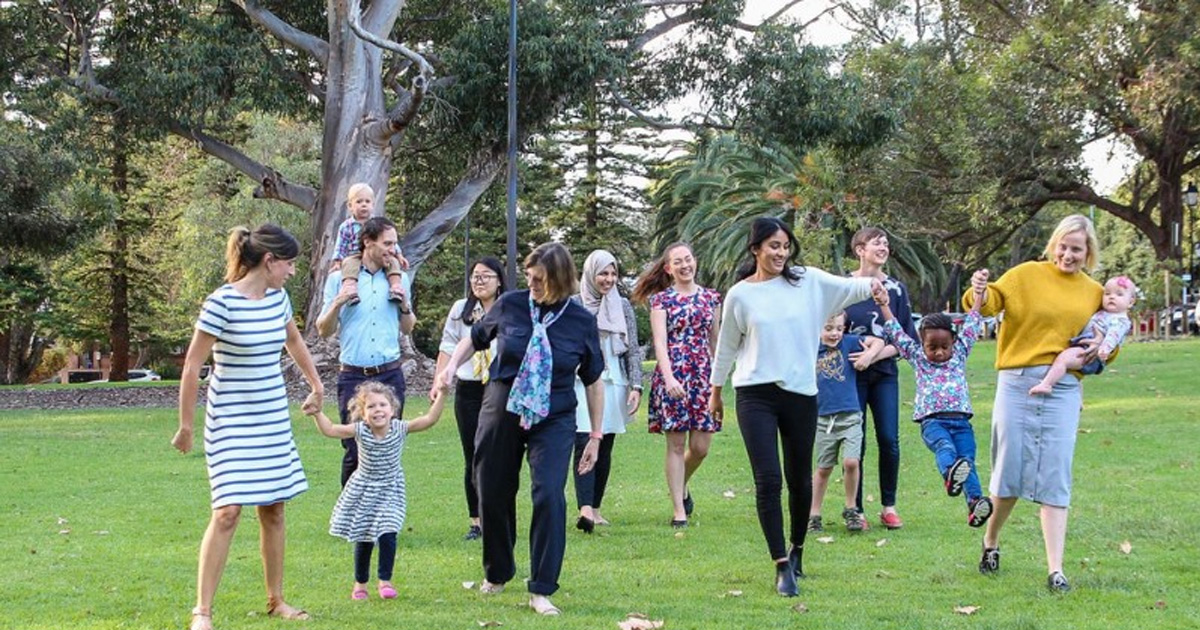 Families walking together in a park 